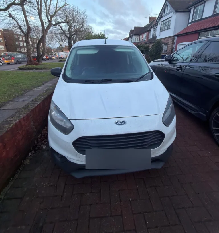 Front of a First Choice Transportation Ford Transit Courier small van