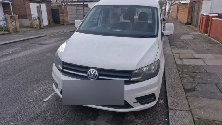 Front of a First Choice Transportation VW Caddy courier van