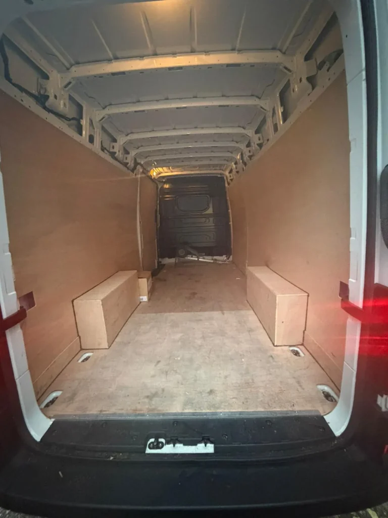 Ply-lined load space inside a VW Crafter LWB high roof van, First Choice Transportation