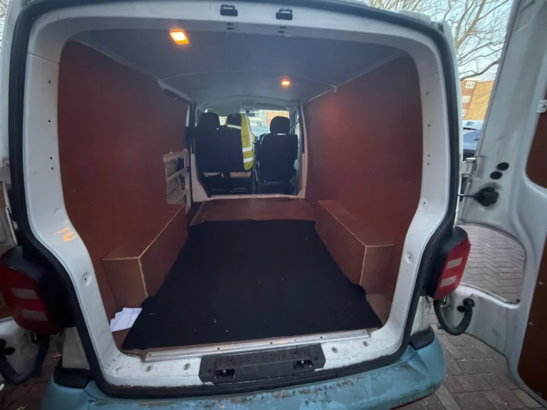 Ply-lined load space of a First Choice Transportation VW Transporter courier van