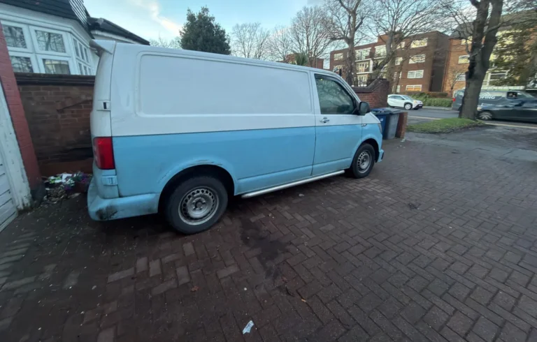 Side view of a First Choice Transportation VW Transporter same day courier van